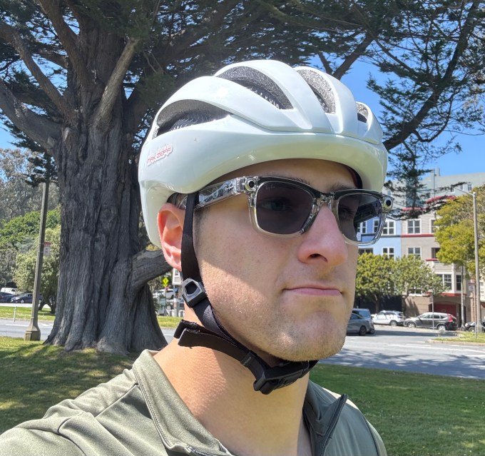 Ray-Ban Meta glasses worn under a bicycle helmet