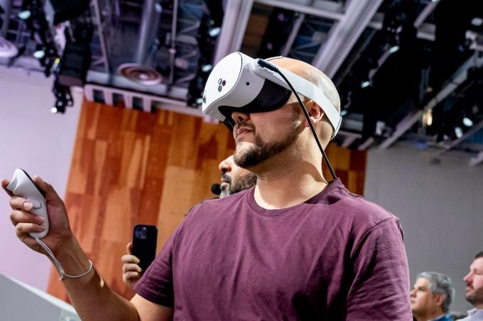 An attendee wears a Quest 3s virtual reality headset
